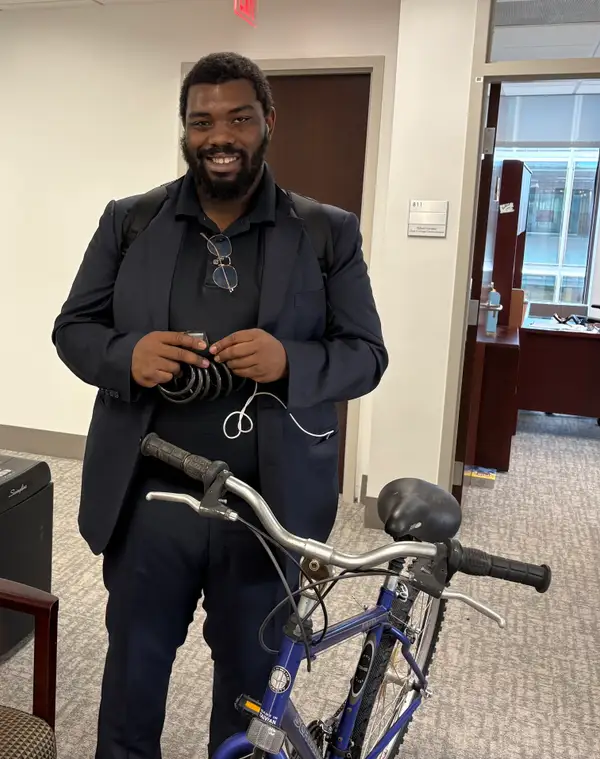 Manuel Vera with a restored bicycle ready for a new rider.